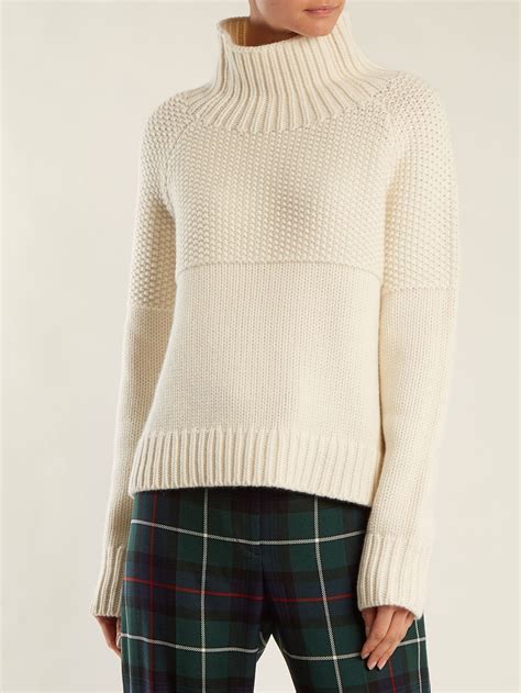 burberry knitted boots|Burberry cashmere sweater and bottom.